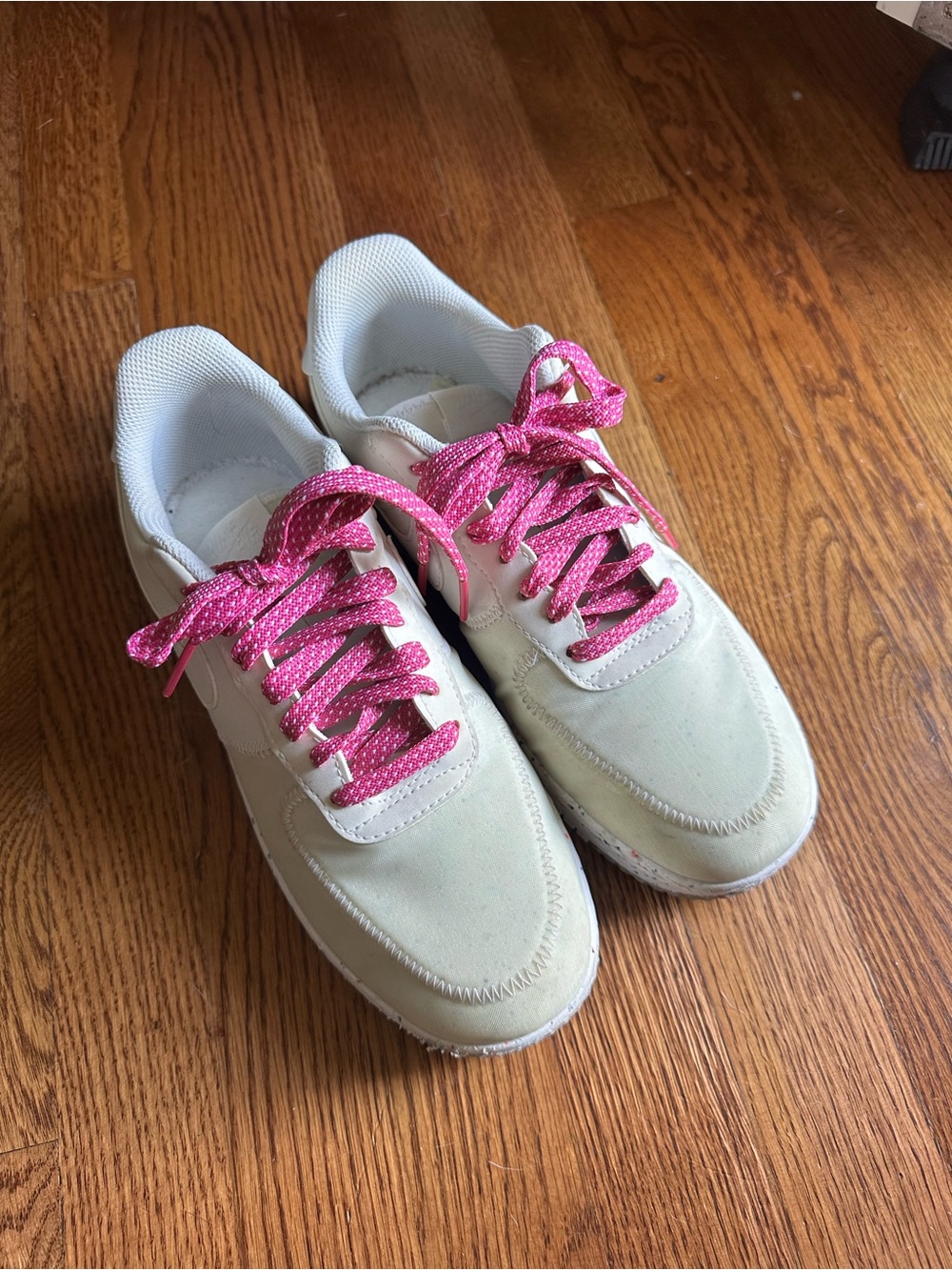 White Women's Nike Air Force 1 Athletic Sneakers with Pink Laces
